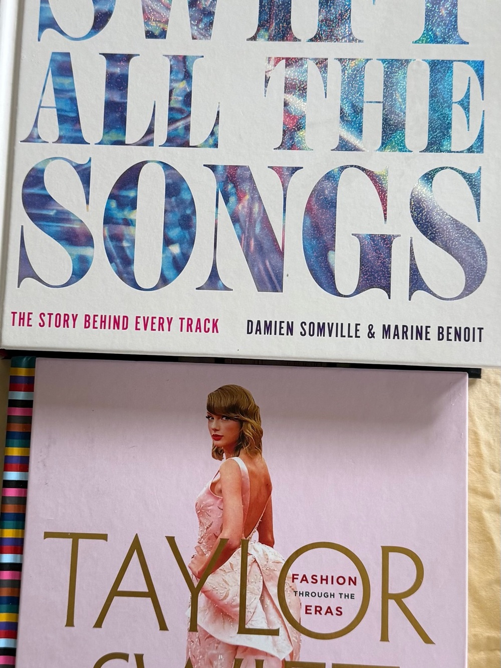 2 Taylor Swift books: Fashion Through the Eras and All The Songs hard covers